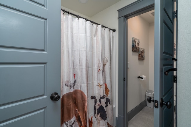 bathroom featuring tile patterned flooring