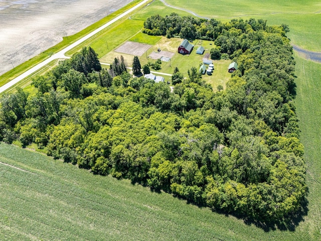 birds eye view of property with a rural view