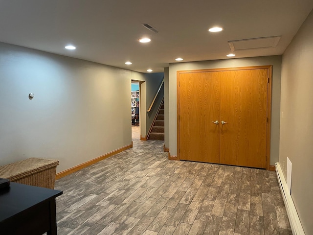 corridor featuring dark hardwood / wood-style floors