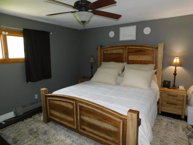 675 10th St, Granite Falls, MN 56241 - bedroom featuring a ceiling fan and baseboards