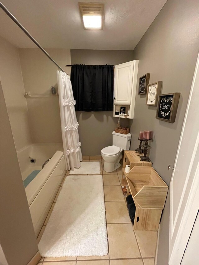 675 10th St, Granite Falls, MN 56241 - full bath featuring tile patterned flooring and shower / bath combination with curtain