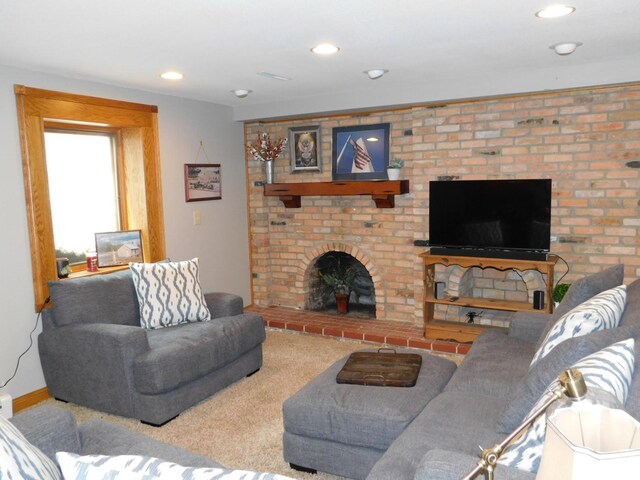 675 10th St, Granite Falls, MN 56241 - carpeted living room featuring a fireplace and recessed lighting