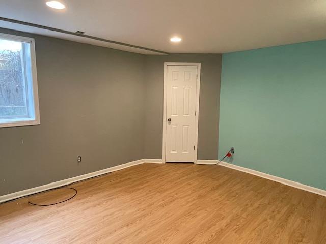 675 10th St, Granite Falls, MN 56241 - spare room featuring wood finished floors and recessed lighting