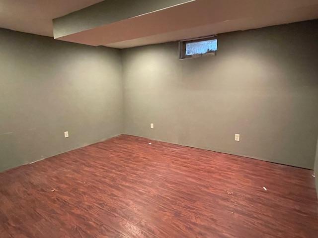 675 10th St, Granite Falls, MN 56241 - below grade area featuring wood finished floors