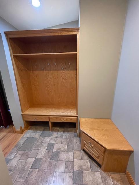 675 10th St, Granite Falls, MN 56241 - mudroom with stone finish flooring and baseboards