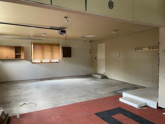 675 10th St, Granite Falls, MN 56241 - garage with a garage door opener