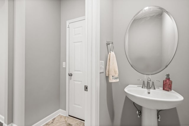 bathroom with tile patterned floors