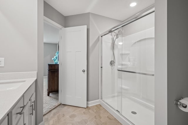 10896 Territorial Trl, Dayton, MN 55369 - bathroom with vanity, baseboards, and a stall shower