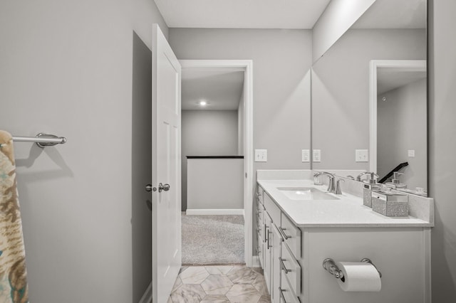 bathroom with vanity and tile patterned floors