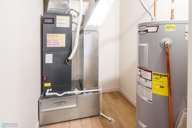 utility room with water heater