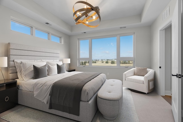 1 Hill Farm Rd Unit 301, North Oaks, MN 55127 - carpeted bedroom with a chandelier and a raised ceiling