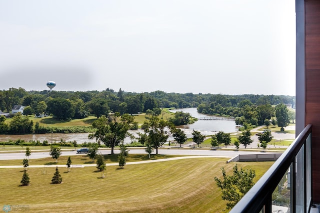 view of community with a water view