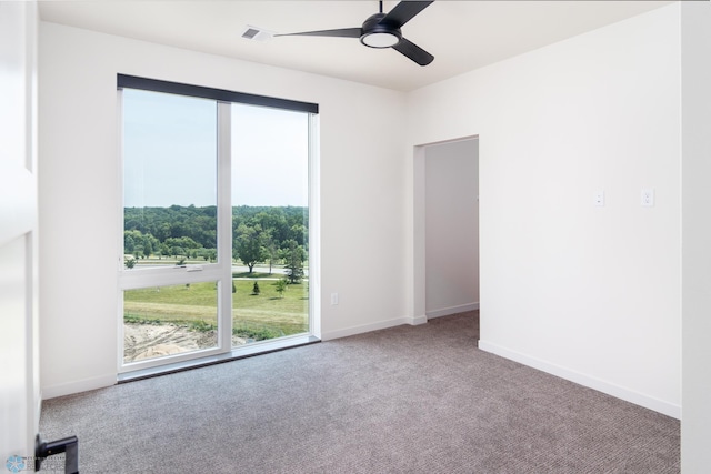 carpeted empty room with ceiling fan