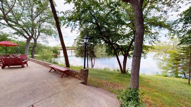 view of patio / terrace featuring a water view