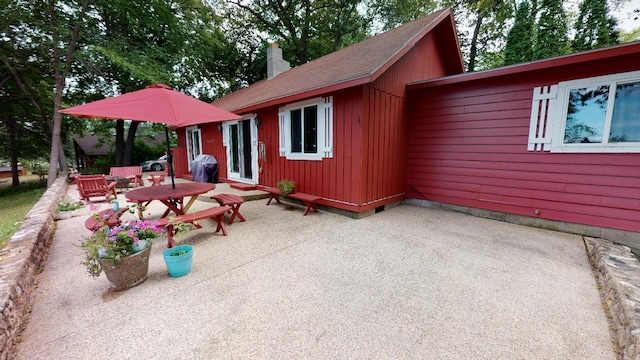 rear view of property with a patio