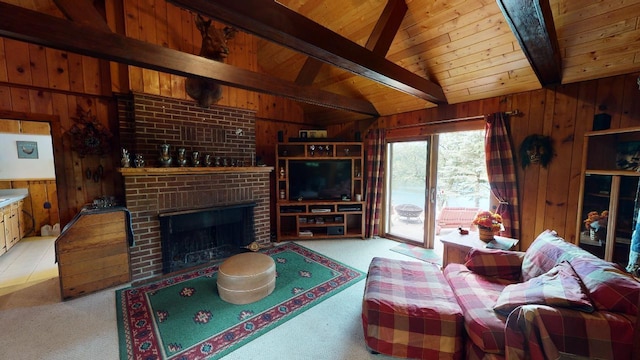 living room with brick wall, a fireplace, light colored carpet, and wooden walls