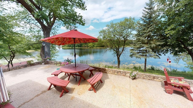 view of patio featuring a water view