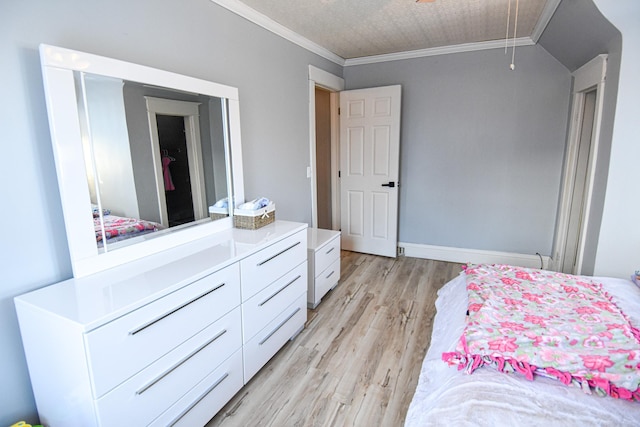 bedroom featuring light wood-type flooring and ornamental molding