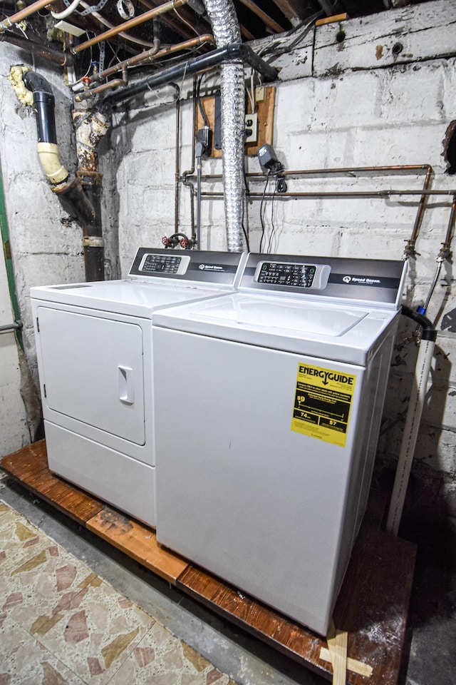 washroom featuring washer and dryer