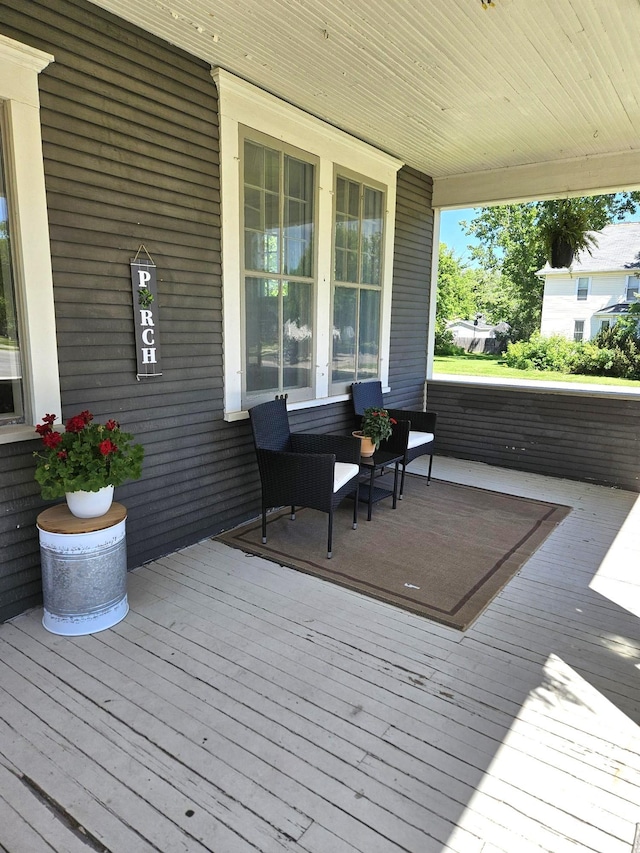 721 Labree Ave N, Thief River Falls, MN 56701 - deck featuring covered porch