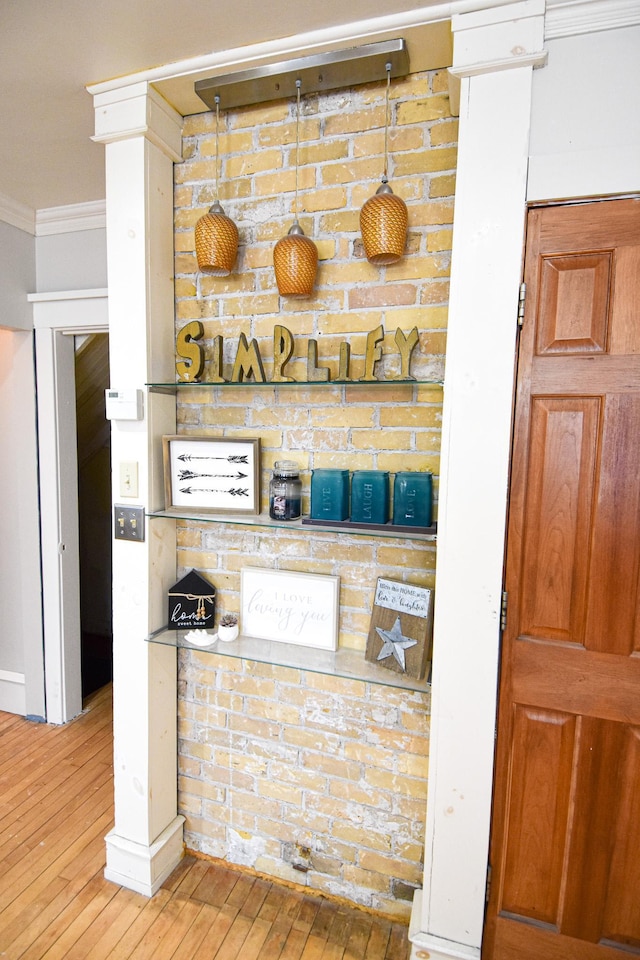 721 Labree Ave N, Thief River Falls, MN 56701 - detailed view of crown molding and wood finished floors