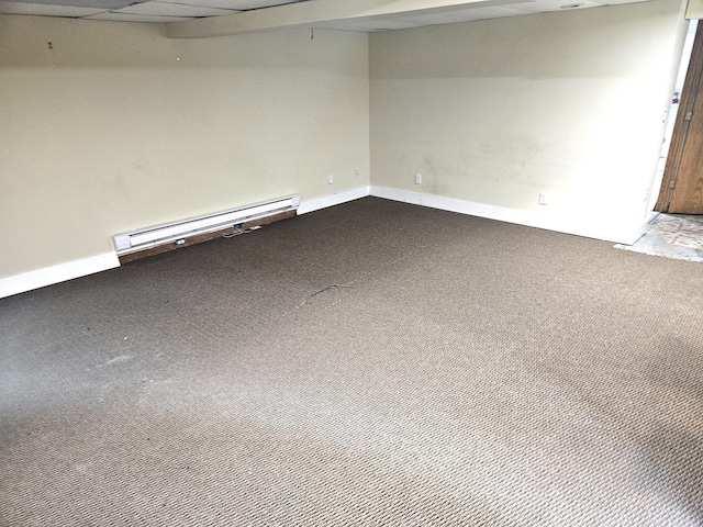721 Labree Ave N, Thief River Falls, MN 56701 - carpeted spare room featuring a baseboard heating unit and baseboards