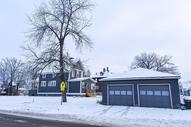 721 Labree Ave N, Thief River Falls, MN 56701 - view of front of property featuring a garage