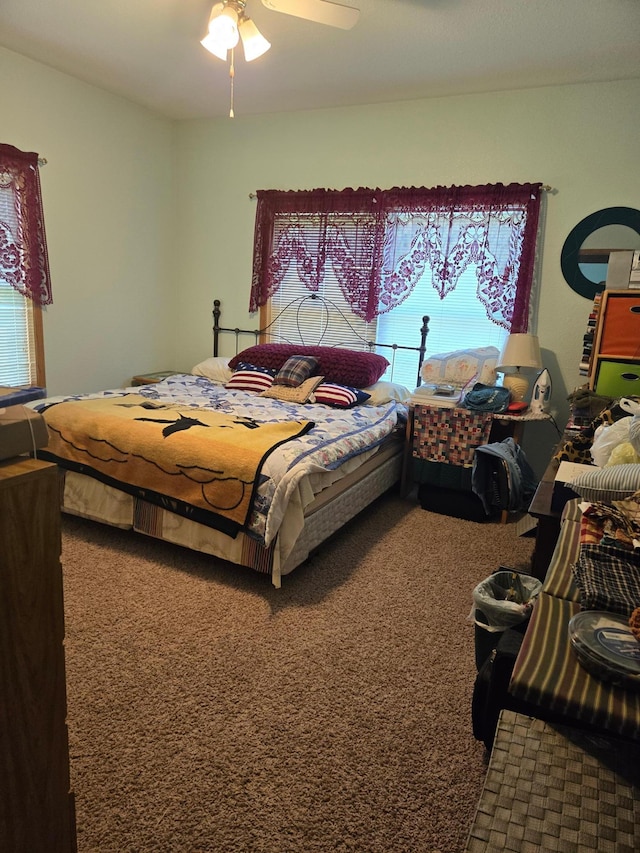 bedroom with carpet floors and ceiling fan