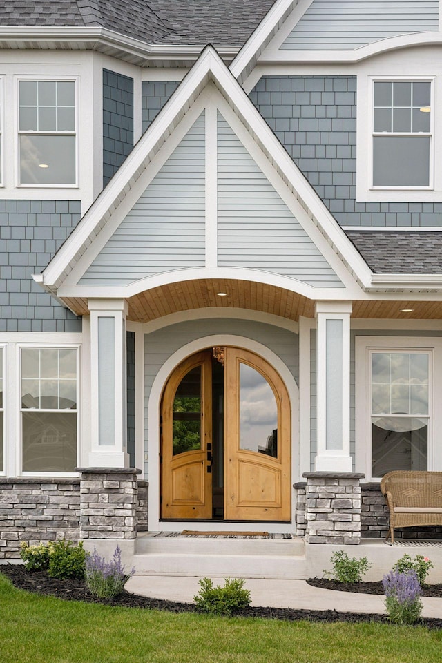 doorway to property featuring a porch