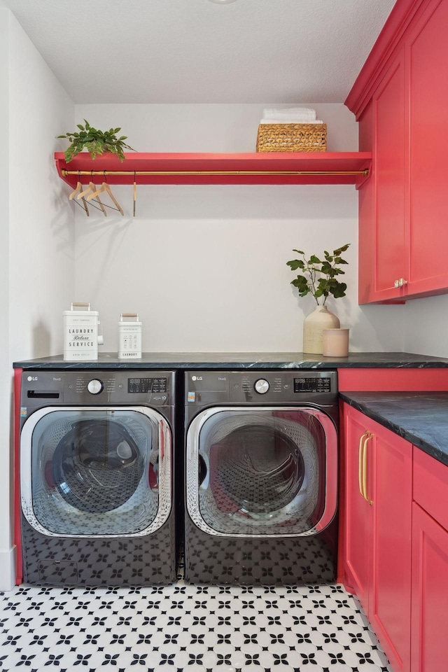 21412 Poate Ct, Rogers, MN 55374 - laundry room with cabinet space and washing machine and clothes dryer