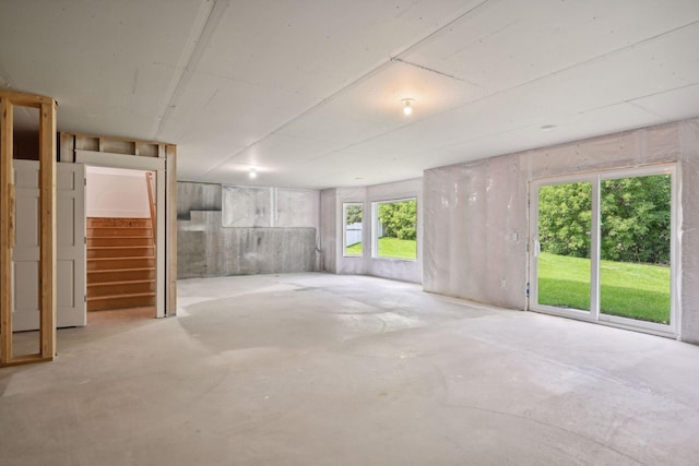 21412 Poate Ct, Rogers, MN 55374 - interior space featuring stairway and concrete flooring