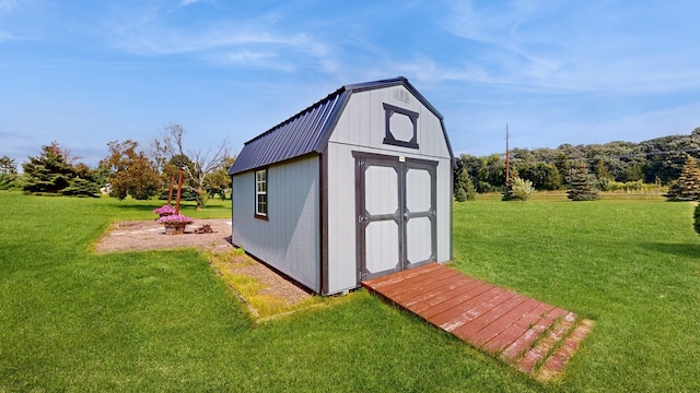 view of outdoor structure with a lawn