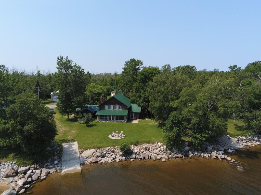 6449 Birch Beach Dr NW, Prosper Twp, MN 56686 - bird's eye view featuring a water view and a wooded view