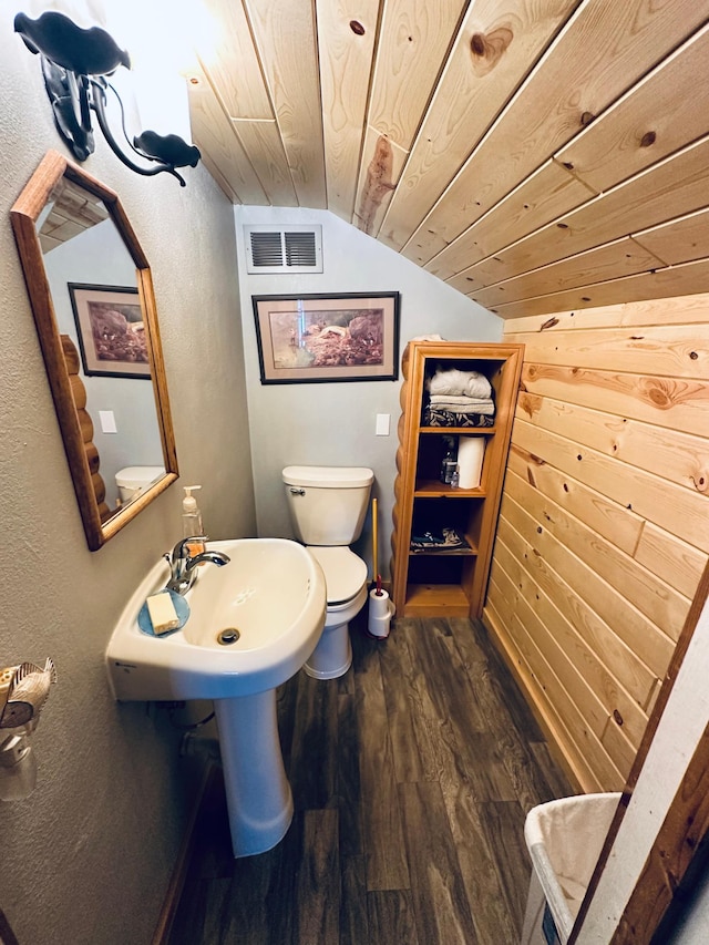 bathroom with wood-type flooring, toilet, vaulted ceiling, and wooden ceiling