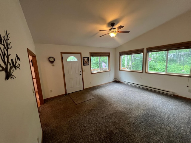 foyer with ceiling fan, a baseboard radiator, vaulted ceiling, and dark carpet