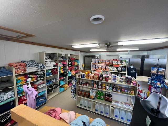 interior space featuring ceiling fan