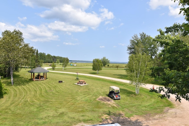 surrounding community featuring a yard and a gazebo