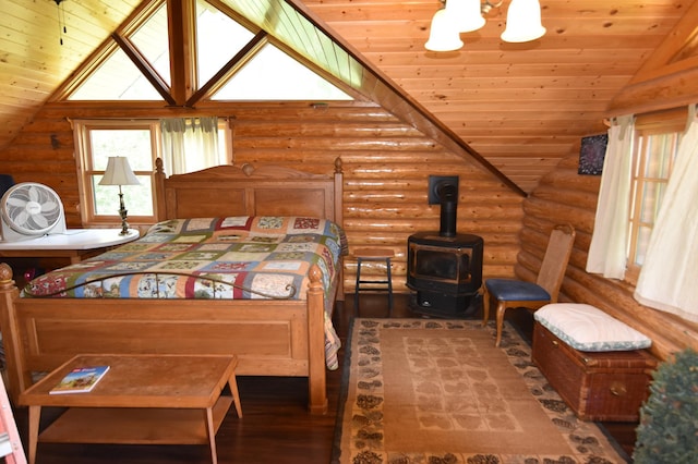 bedroom featuring log walls, vaulted ceiling, a wood stove, wood ceiling, and dark wood-type flooring