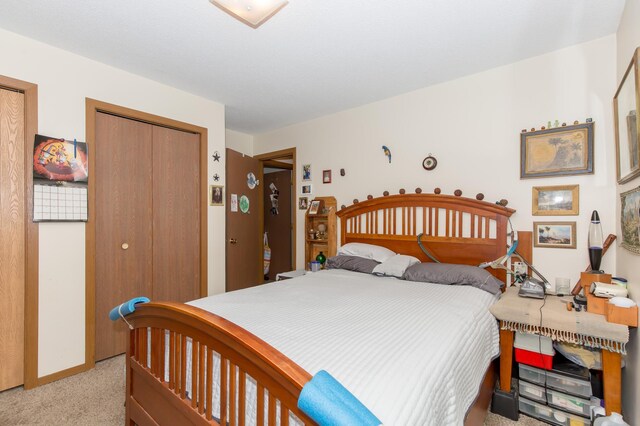 bedroom with light carpet