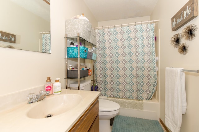 full bathroom featuring shower / bathtub combination with curtain, vanity, and toilet