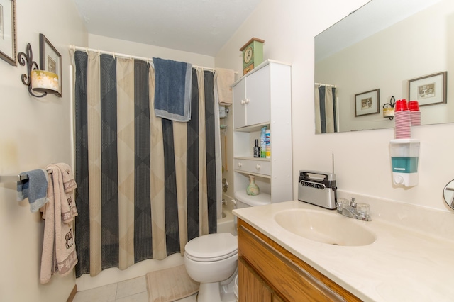 full bathroom with vanity, shower / bath combo, tile patterned floors, and toilet