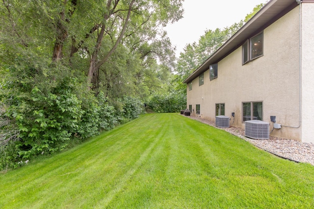 view of yard featuring central AC