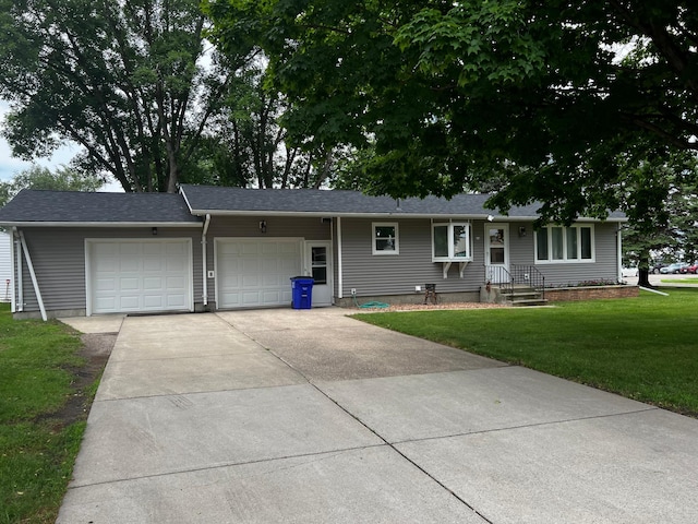 618 Memorial Pl, Dawson, MN 56232 - ranch-style house with an attached garage, driveway, and a front lawn