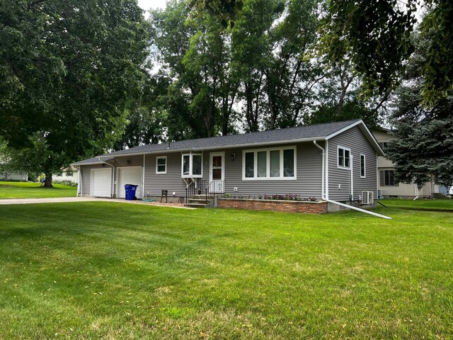 618 Memorial Pl, Dawson, MN 56232 - ranch-style house featuring an attached garage, a front yard, and driveway