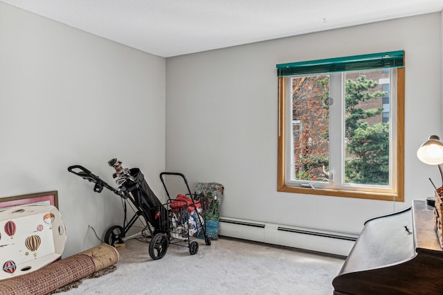 playroom with light carpet and a baseboard radiator