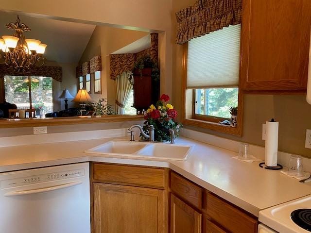 kitchen featuring a sink, an inviting chandelier, brown cabinetry, light countertops, and dishwasher