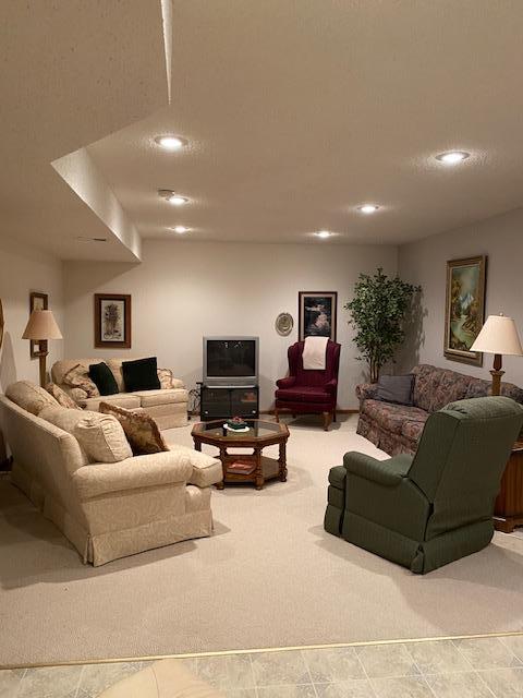 living area featuring recessed lighting