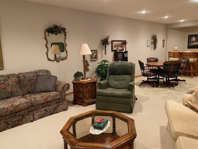 carpeted living room with recessed lighting