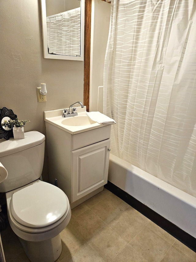 full bathroom with vanity, toilet, and shower / tub combo with curtain