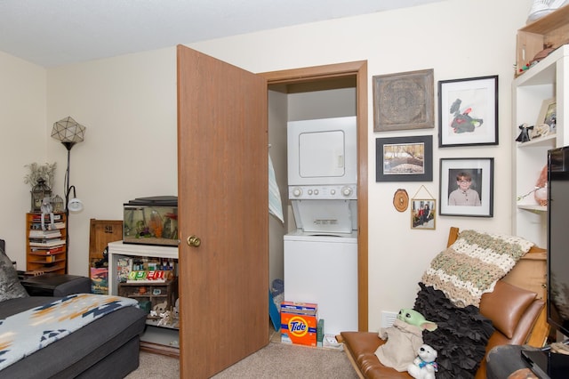 1600 Roundhouse Cir, Shakopee, MN 55379 - clothes washing area featuring stacked washer / drying machine and carpet flooring